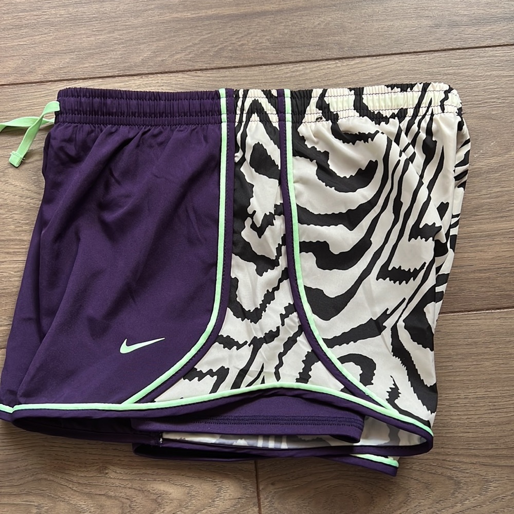 NIKE girls lined running shorts, medium purple patterned shorts